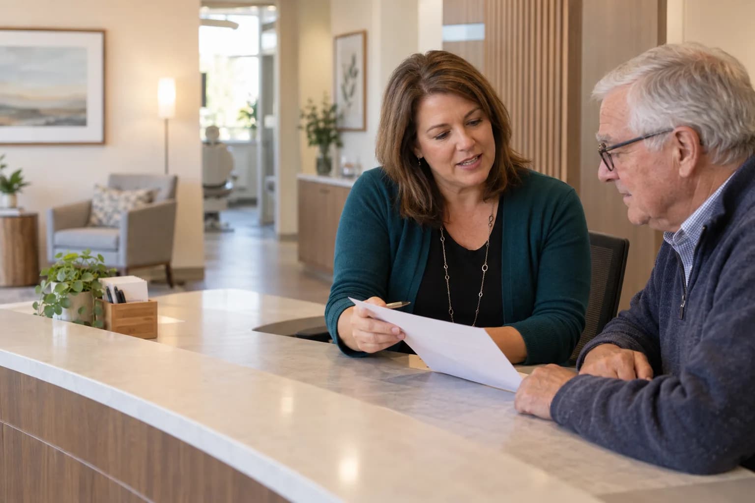 Illustration of an office manager discussing a treatment estimate with a patient